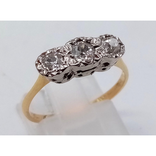 25 - A VINTAGE 18K GOLD RING IN LOVELY CONDITION WITH 3 QUALITY DIAMONDS SET IN PLATINIUM .  2.82gms   si... 