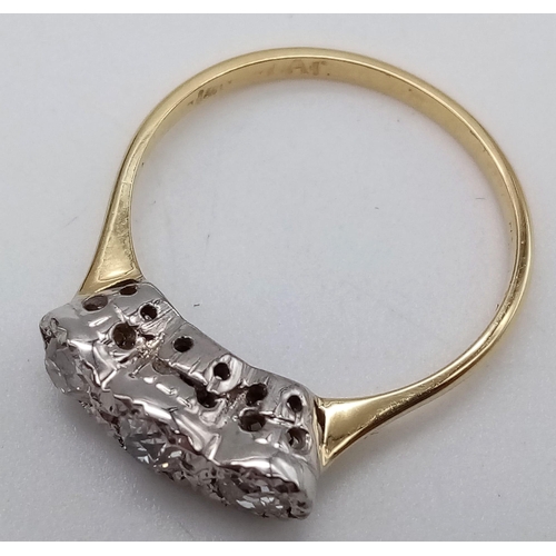 25 - A VINTAGE 18K GOLD RING IN LOVELY CONDITION WITH 3 QUALITY DIAMONDS SET IN PLATINIUM .  2.82gms   si... 