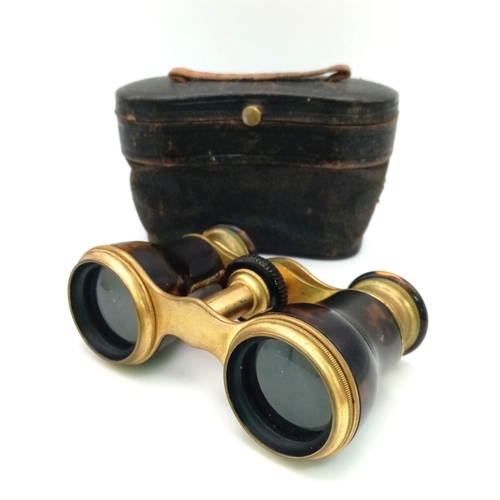 269 - An Antique Pair of Faux Tortoiseshell Opera Glasses. In very good condition and working order - lens... 