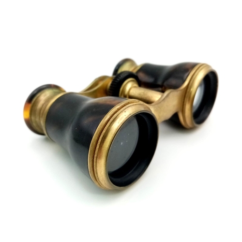 269 - An Antique Pair of Faux Tortoiseshell Opera Glasses. In very good condition and working order - lens... 