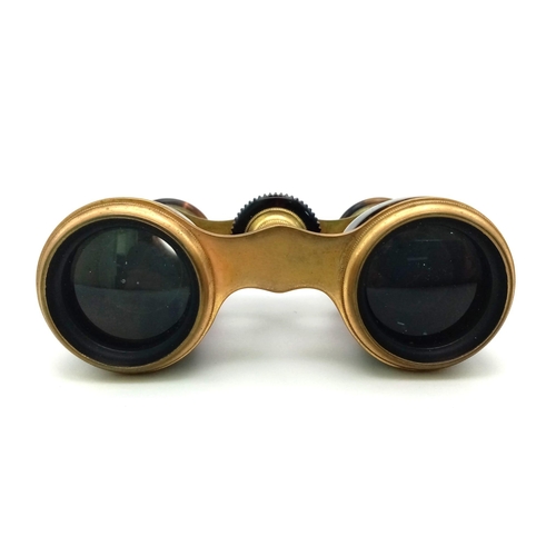 269 - An Antique Pair of Faux Tortoiseshell Opera Glasses. In very good condition and working order - lens... 