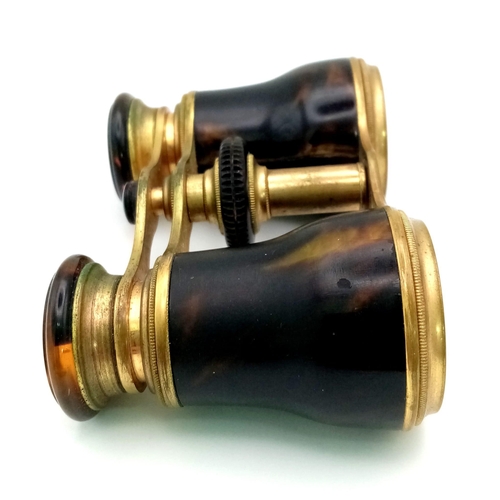 269 - An Antique Pair of Faux Tortoiseshell Opera Glasses. In very good condition and working order - lens... 