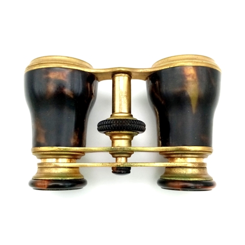 269 - An Antique Pair of Faux Tortoiseshell Opera Glasses. In very good condition and working order - lens... 