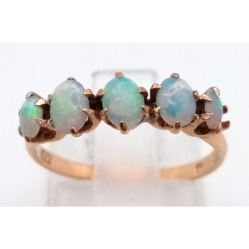 271 - An Antique 10K Yellow Gold Fire Opal Five-Stone Ring. Size L. 1.61g total weight.