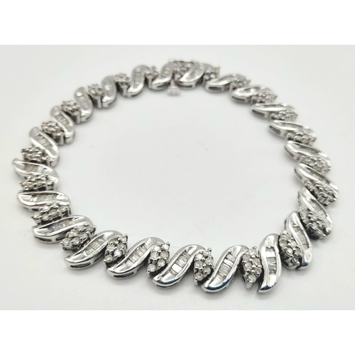 13 - A 14 K white gold bracelet with diamonds (2.50 carats). Length: 18 cm, weight: 15.3 g.