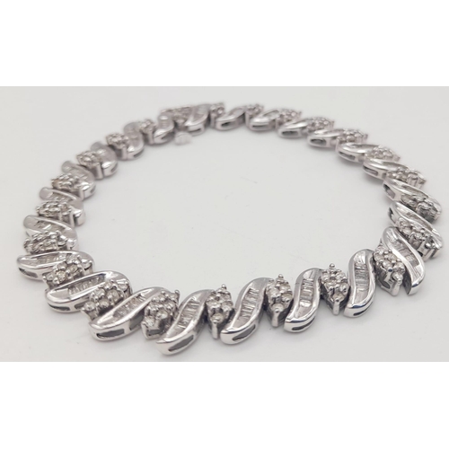 13 - A 14 K white gold bracelet with diamonds (2.50 carats). Length: 18 cm, weight: 15.3 g.