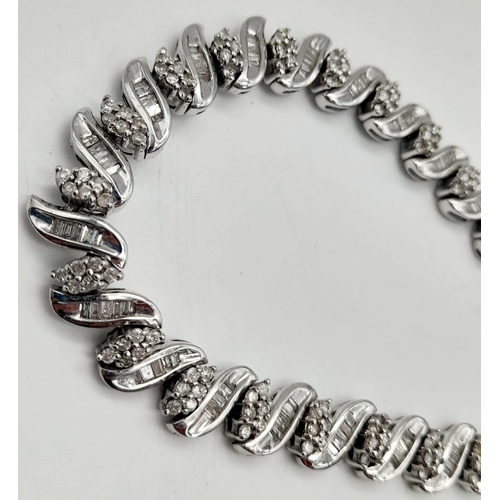 13 - A 14 K white gold bracelet with diamonds (2.50 carats). Length: 18 cm, weight: 15.3 g.