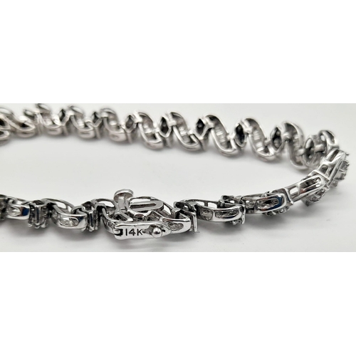 13 - A 14 K white gold bracelet with diamonds (2.50 carats). Length: 18 cm, weight: 15.3 g.