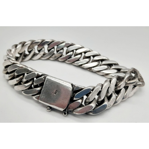 135 - A sterling silver chain bracelet. Length: 22 mm, weight: 113 g.