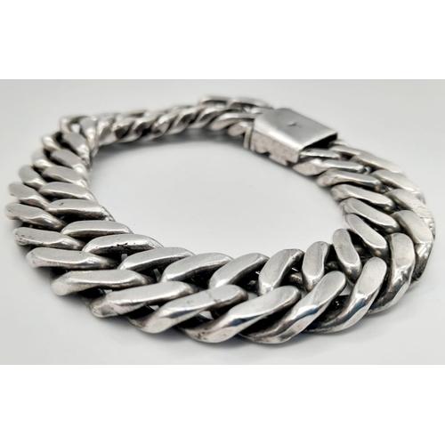 135 - A sterling silver chain bracelet. Length: 22 mm, weight: 113 g.