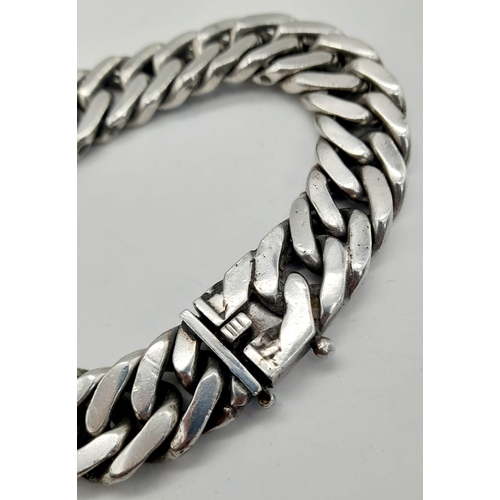 135 - A sterling silver chain bracelet. Length: 22 mm, weight: 113 g.