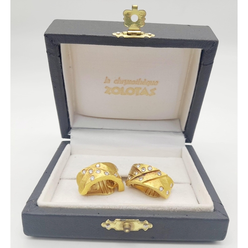 20 - A spectacular 22 K yellow gold clip earrings with diamonds,  by the renowned Greek designer ZOLOTAS.... 