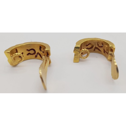 20 - A spectacular 22 K yellow gold clip earrings with diamonds,  by the renowned Greek designer ZOLOTAS.... 