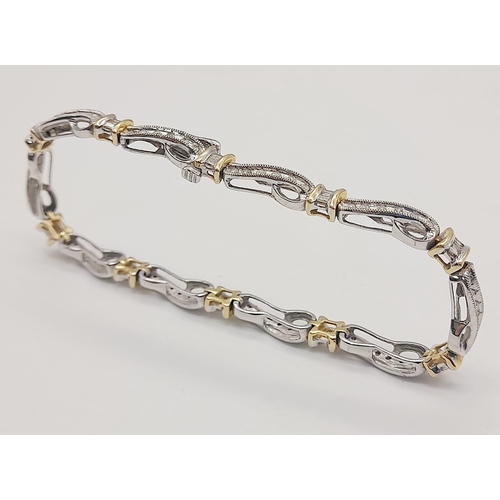 65 - A 14 K yellow and white gold bracelet with diamonds (1.10 carats).Length: 18 cm, weight: 13.1 g.