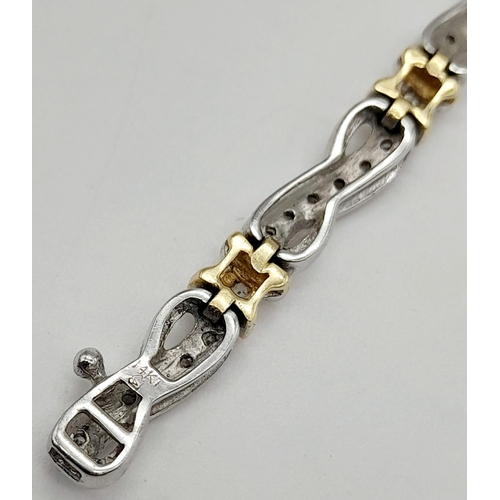 65 - A 14 K yellow and white gold bracelet with diamonds (1.10 carats).Length: 18 cm, weight: 13.1 g.