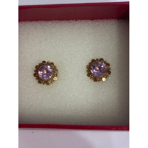 118 - Pair of 9 carat GOLD EARRINGS set with AMETHYST complete with hallmarked 9 carat gold backs. 1.5 gra... 