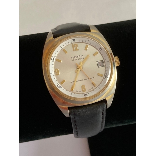 266 - Gentlemans vintage ROMA Wristwatch. Having golden digits and hands with date window and sweeping sec... 