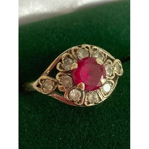 35 - Vintage 9 carat GOLD RUBY RING having cushion cut RUBY mounted to top with Aqua gemstone surround. P... 