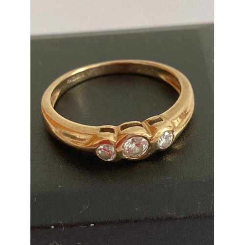 7 - 9 carat GOLD RING Having three sparkling Zirconias set to top. Full UK Hallmark. Complete with ring ... 