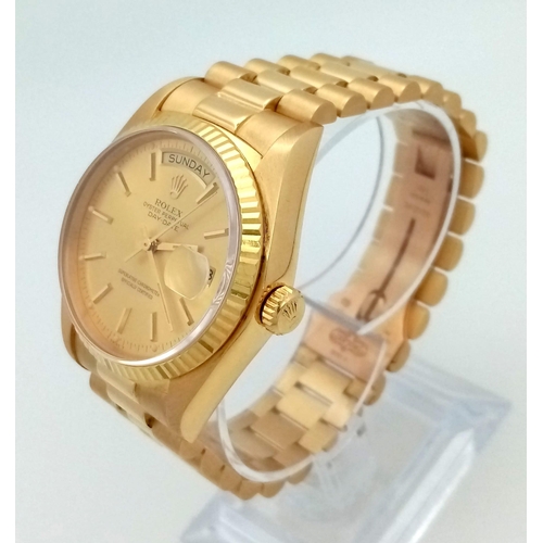 115 - AN 18K GOLD ROLEX OYSTER PERPETUAL DAY-DATE WITH GOLDTONE FACE COMES WITH I.D.CERTIFICATE  34mm