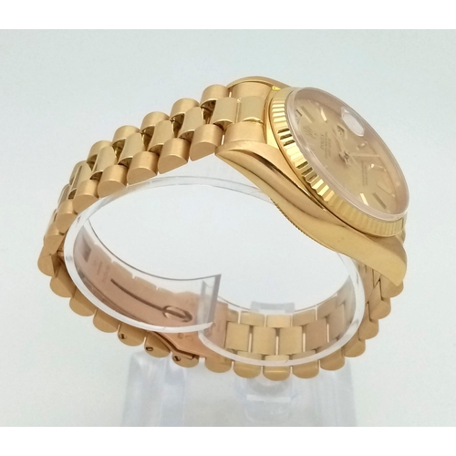 115 - AN 18K GOLD ROLEX OYSTER PERPETUAL DAY-DATE WITH GOLDTONE FACE COMES WITH I.D.CERTIFICATE  34mm