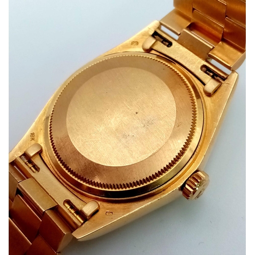 115 - AN 18K GOLD ROLEX OYSTER PERPETUAL DAY-DATE WITH GOLDTONE FACE COMES WITH I.D.CERTIFICATE  34mm