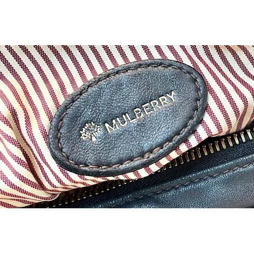 270 - A Vintage Mulberry Black Leather Handbag with Dust Cover. Two outer pockets. Striped textile interio... 