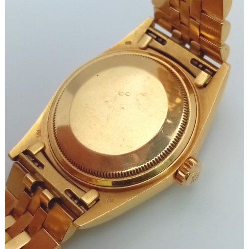 109 - AN 18K GOLD ROLEX OYSTER PERPETUAL DATEJUST WITH SOLID GOLD STRAP AND GOLDTONE DIAL . 36mm