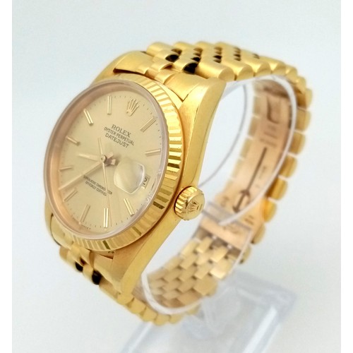 109 - AN 18K GOLD ROLEX OYSTER PERPETUAL DATEJUST WITH SOLID GOLD STRAP AND GOLDTONE DIAL . 36mm