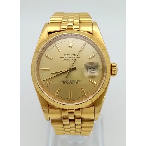 109 - AN 18K GOLD ROLEX OYSTER PERPETUAL DATEJUST WITH SOLID GOLD STRAP AND GOLDTONE DIAL . 36mm