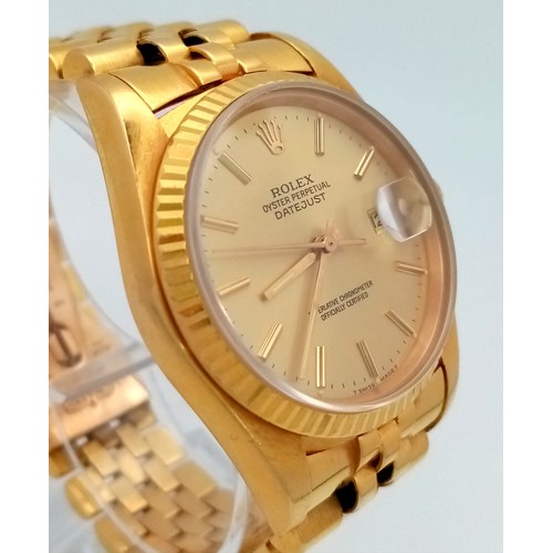 109 - AN 18K GOLD ROLEX OYSTER PERPETUAL DATEJUST WITH SOLID GOLD STRAP AND GOLDTONE DIAL . 36mm