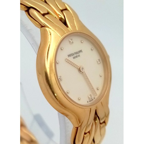 81 - A LADIES PATEK PHILIPPE 18K GOLD WATCH WITH DIAMOND NUMERALS AND UNUSUAL TWIST HANDS. 23mm