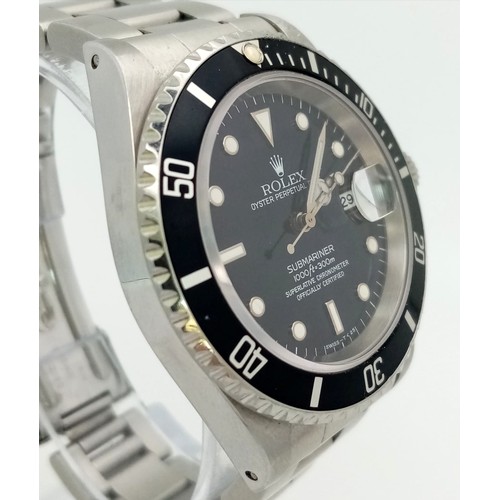 36 - A ROLEX SUBMARINER - THE ULTIMATE DIVERS WATCH IN STAINLESS STEEL WITH BLACK DIAL AND BEZEL . 40mm A... 