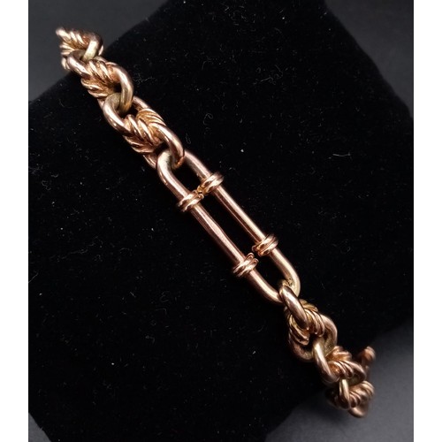 3 - An Antique 9K Rose Gold T-Bar Albert Chain. Elongated and circle-twist links. 38.73g. 25cm