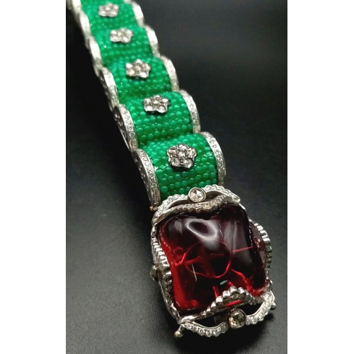 74 - A REAL STATEMENT PIECE OF JEWELLERY, A SENSATIONAL 18K WHITE GOLD BRACELET COVERED IN EMERALDS AND D... 