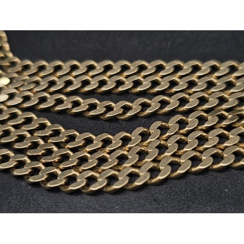 10 - A 9K Yellow Gold Flat Link Curb Necklace. 56cm. 18.3g