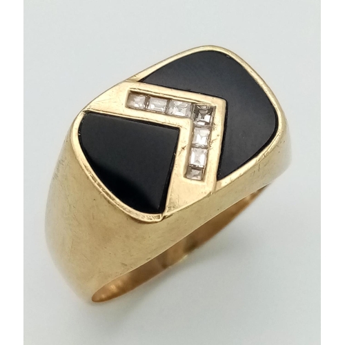 31 - A Vintage 9K Yellow Gold, Onyx and Diamond Signet Ring. A diamond chevron on black onyx. Size U 1/2.... 