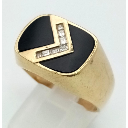 31 - A Vintage 9K Yellow Gold, Onyx and Diamond Signet Ring. A diamond chevron on black onyx. Size U 1/2.... 