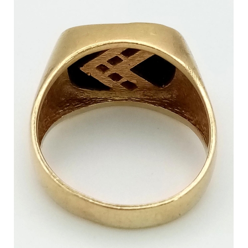 31 - A Vintage 9K Yellow Gold, Onyx and Diamond Signet Ring. A diamond chevron on black onyx. Size U 1/2.... 