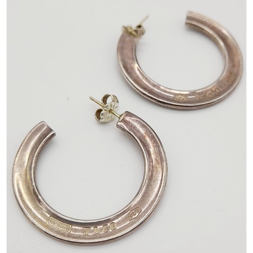 93 - A Vintage Pair of 925 Silver Tiffany and Co. Hoop Earrings.