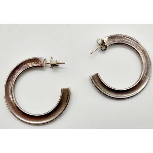 93 - A Vintage Pair of 925 Silver Tiffany and Co. Hoop Earrings.