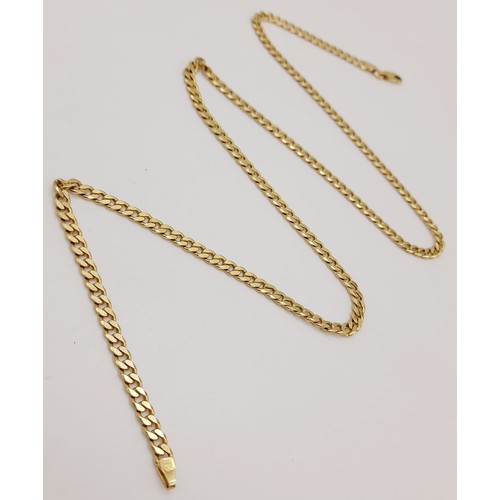 30 - A 14 K yellow gold curb chain. Length: 52 cm, weight: 16.5 g.