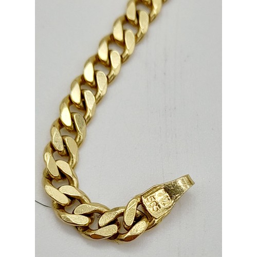 30 - A 14 K yellow gold curb chain. Length: 52 cm, weight: 16.5 g.