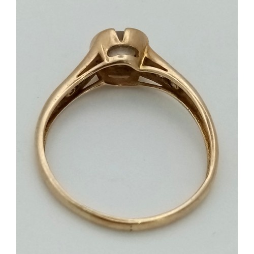 775 - A 9K Yellow Gold White Stone Ring. Size P. 2.11g total weight.