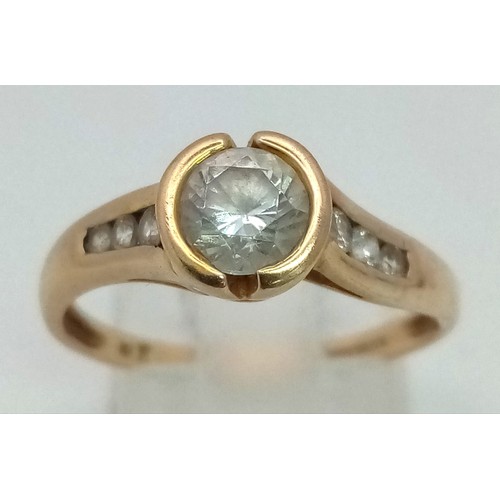 775 - A 9K Yellow Gold White Stone Ring. Size P. 2.11g total weight.