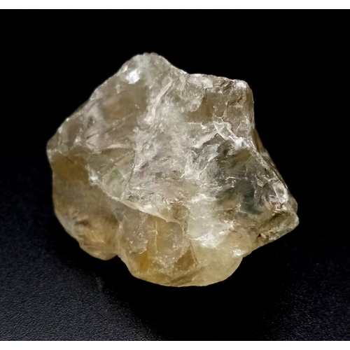 1085 - A 110ct Translucent Smoky Lemon Quartz Rough Gemstone. GLI Certified