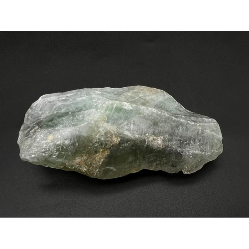 1099 - A 740ct Green Amethyst Rough Gemstone. GLI Certified.