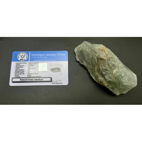 1099 - A 740ct Green Amethyst Rough Gemstone. GLI Certified.