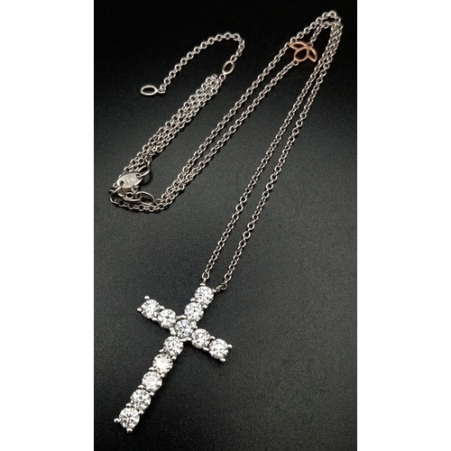 121 - A Browns Designer Diamond Cross Pendant on an 18K White Gold Necklace. 4.5ctw of quality white Si1 c... 