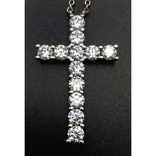 121 - A Browns Designer Diamond Cross Pendant on an 18K White Gold Necklace. 4.5ctw of quality white Si1 c... 